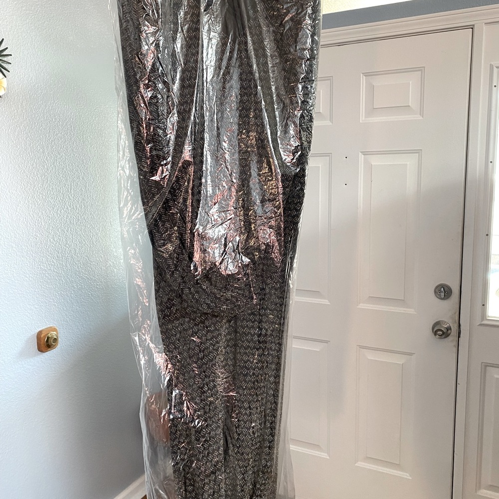 This is a beautiful dress, new never worn..